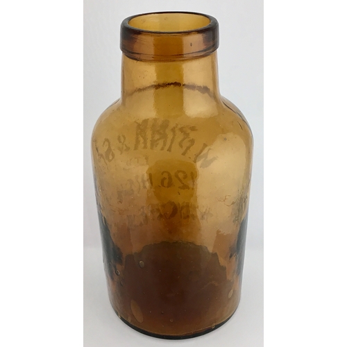 670 - WINCHESTER PHARMACY JAR. 8.25ins tall. Amber glass, cylindrical shape, rounded shoulders, wide neck ... 