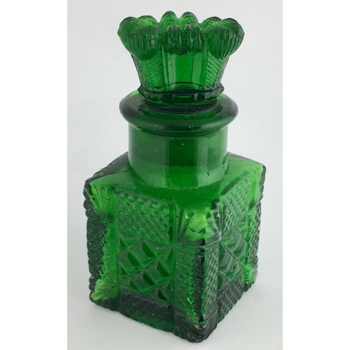 671 - SMELLING SALTS BOTTLE. 4ins tall. Bright green glass, multi facetted cut glass, square body, with im... 