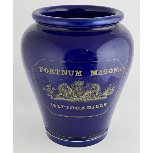 672 - FORTNUM & MASON PHARMACY JAR. 5.5ins tall. Dark blue glaze, tapering jar, wide mouth. Front transfer... 