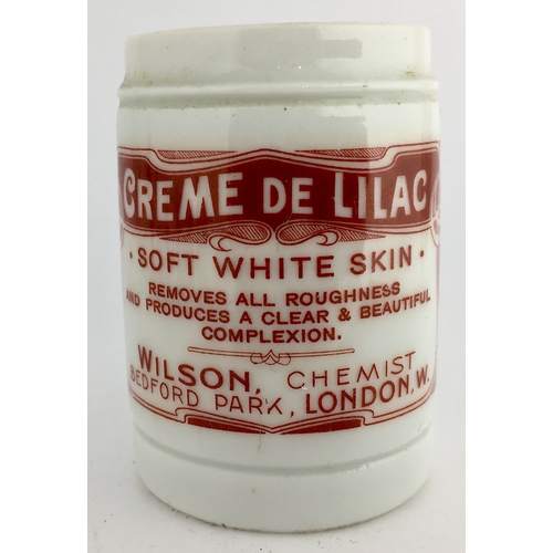 680 - LONDON CREME DE LILAC OINTMENT POT. 2.5ins tall. Cylindrical shape, rust brown transfer CREME DE LIL... 