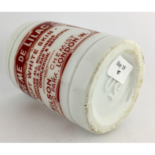 680 - LONDON CREME DE LILAC OINTMENT POT. 2.5ins tall. Cylindrical shape, rust brown transfer CREME DE LIL... 