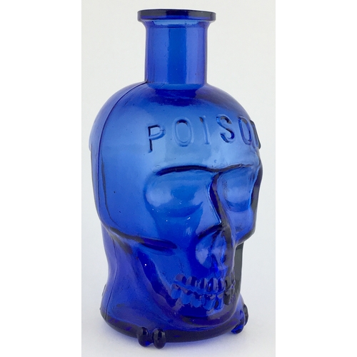 684 - ENGLISH MADE LARGE SIZE SKULL POISON BOTTLE. (DP pg 20 - correctly dubbed ‘deaths head’) 4.25ins tal... 