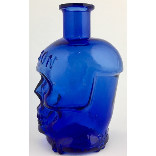 684 - ENGLISH MADE LARGE SIZE SKULL POISON BOTTLE. (DP pg 20 - correctly dubbed ‘deaths head’) 4.25ins tal... 