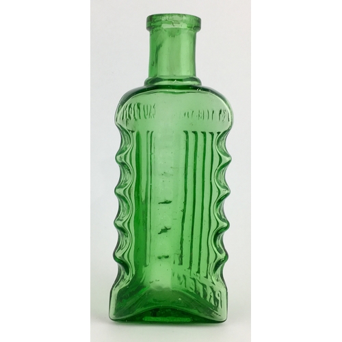 685 - WILSONS PATENT POISON BOTTLE. (DP pg 59) 4.5ins tall. Triangular shape, green glass with scalloped e... 