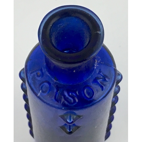 686 - L & T PATENT POISON BOTTLE. (DP pg 50) 3.75ins tall. Cylindrical shape, cobalt blue glass, with 4 co... 