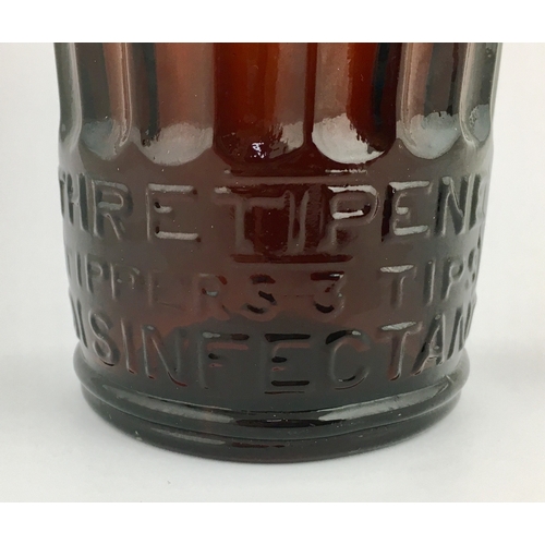 689 - TIPPERS POISON BOTTLE. (DP pg 41) 9ins tall. Cylindrical shape, amber glass, tapering outwards from ... 