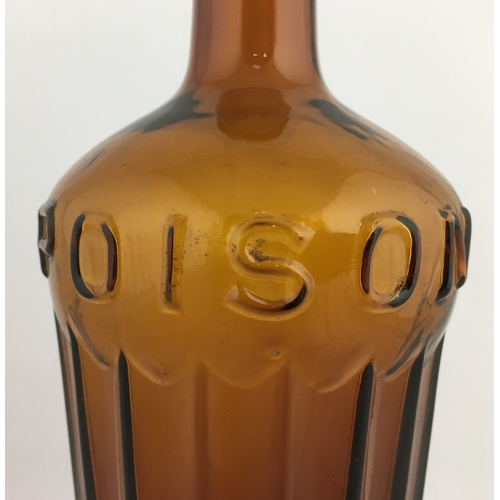 689 - TIPPERS POISON BOTTLE. (DP pg 41) 9ins tall. Cylindrical shape, amber glass, tapering outwards from ... 