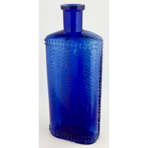 691 - FOULSTON’S CRECENT POISON BOTTLE. (DP pg 57) 6.25ins tall. Cobalt blue glass, crescent shape in sect... 