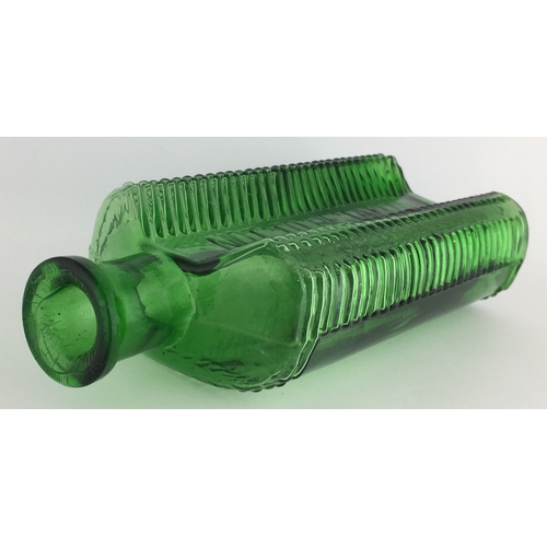 692 - FOULSTON’S CRECENT POISON BOTTLE. (DP pg 57) 6.25ins tall. Green glass, crescent shape in section em... 