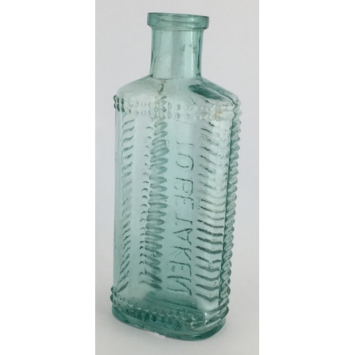 693 - FOULSTON’S CRECENT POISON BOTTLE. (DP pg 57) 5.25ins tall. Aqua glass, crescent shape in section emb... 