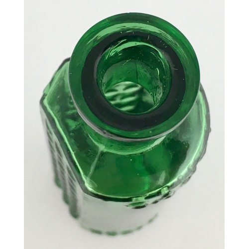 699 - TAYLOR’S PATENT POISON BOTTLE. (DP pg 55) 3.25ins tall. 1oz green glass, one half is semi circular, ... 