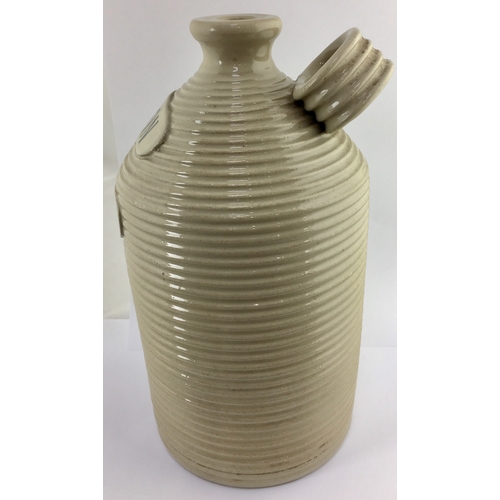 705 - POISON FLAGON. 13ins tall. Straight sided flagon with deep horizontal ribbing, off white glaze, rear... 