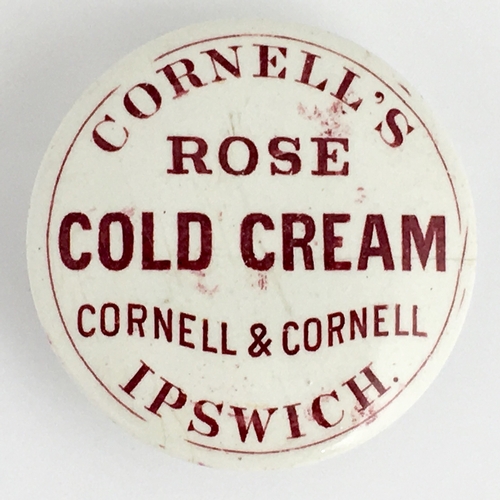 707 - IPSWICH COLD CREAM POT LID. (APL pg 583, 7) 2.5ins diam. Dark red transfer CORNELL’S/ ROSE/ COLD CRE... 