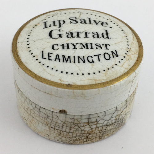 718 - LEAMINGTON LIP SALVE POT LID & BASE. (APL pg 632, 13) 1.75ins diam. Black transfer LIP SALVE/ GARRAD... 