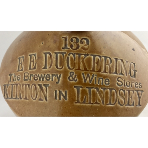 159 - KIRTON IN LINDSEY FLAGON. 13.5ins tall, t.t., s.s., imp’d 132/ E E DUCKERING/ THE BREWERY & WINE STO... 