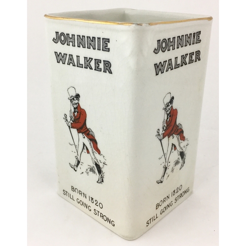 29 - JOHNNIE WALKER WATER JUG. 6ins tall. Square shaped jug with familiar striding Johnnie Walker image t... 