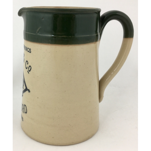 31 - HEREFORD/ DAVIES & CO WATER JUG. 6.4ins tall handled stoneware jug with striking dark green top sect... 