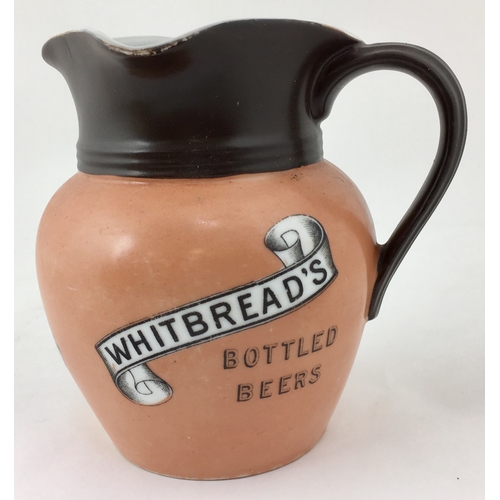 59 - WHITBREAD’S BOTTLED BEERS WATER JUG. 6.1ins tall. Subtly coloured shapely jug, 3 pouring lips, banne... 