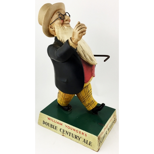 80 - WILLIAM YOUNGER BACK BAR FIGURE. 14ins tall. Rubberoid figure of striding William Younger on wooden ... 