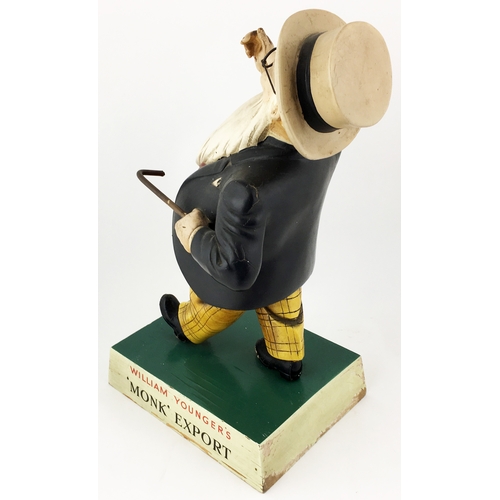 80 - WILLIAM YOUNGER BACK BAR FIGURE. 14ins tall. Rubberoid figure of striding William Younger on wooden ... 