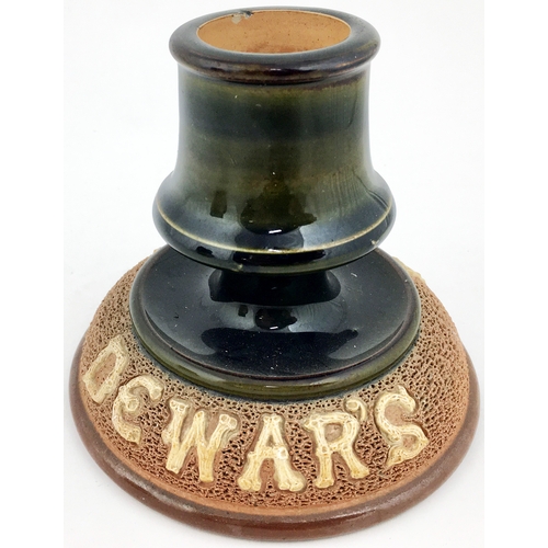 114 - DEWARS CAPSTAN SHAPE MATCHSTRIKER. Sprigged letters to the base striker area.  Doulton Lambeth p.m. ... 