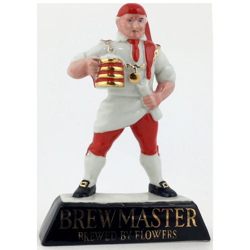 121 - BREWMASTER MINIATURE ADVERTISING BACK BAR FIGURE. 5.3ins tall. Hand painted ceramic with gold letter... 