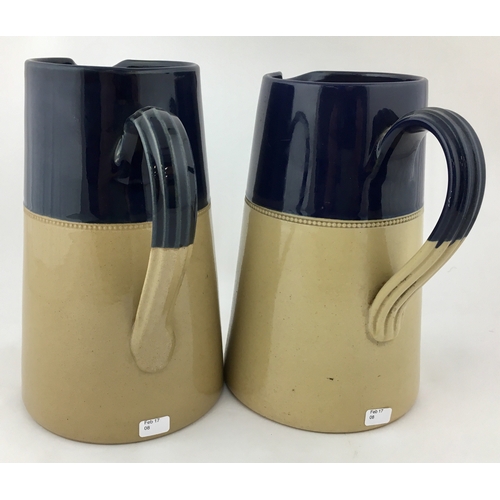 165 - TAYLOR WALKER BEER JUG DUO. 8ins tall. Two variations of blue topped stoneware jugs. Both very good ... 