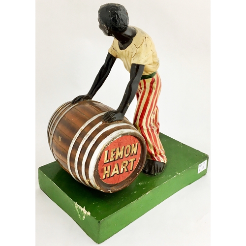 171 - LEMON HART RUM BACK BAR FIGURE. 10ins tall. Rubberoid, some wear/ ageing. (8/10)