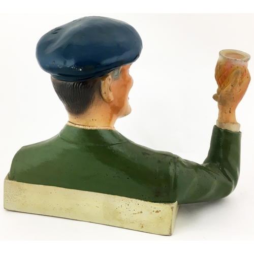 206 - LONG JOHN BACK BAR FIGURE. 8ins tall. Rubberoid bust figure of army officer holding glass aloft. Nee... 