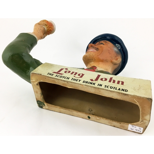 206 - LONG JOHN BACK BAR FIGURE. 8ins tall. Rubberoid bust figure of army officer holding glass aloft. Nee... 