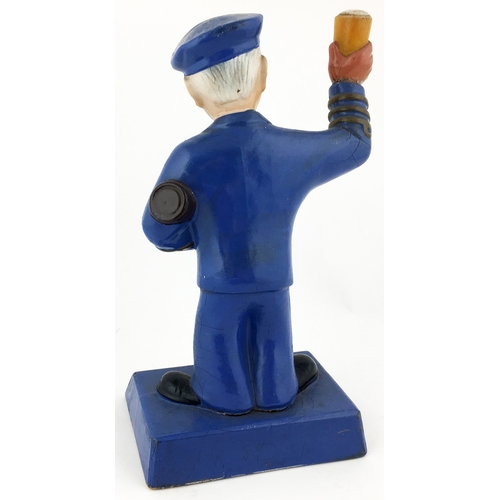 207 - BLUE KEG BACK BAR FIGURE. 7.75ins tall. Rubberoid figure of jolly sailor holding glass aloft. A rare... 