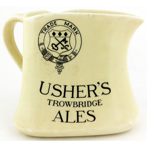 221 - TROWBRIDGE USHER’S ALES JUG. 4.75ins tall. Triangular form jug, shield within buckled belt t.m. eith... 