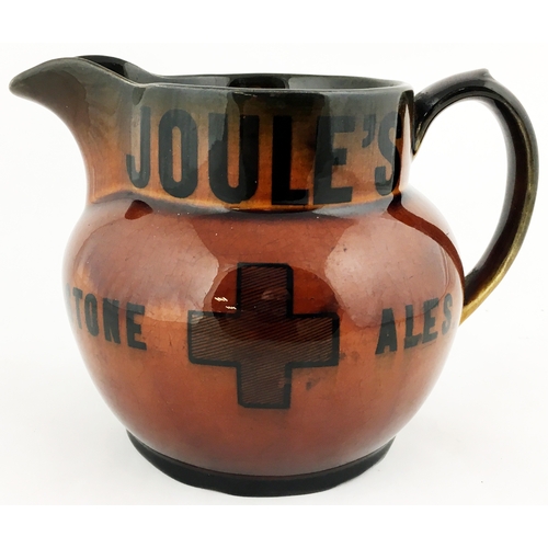 222 - JOULE’S ALE JUG. 4ins tall. Variating glaze. Cross t.m. either side. Ridgway base mark. Very good. (... 