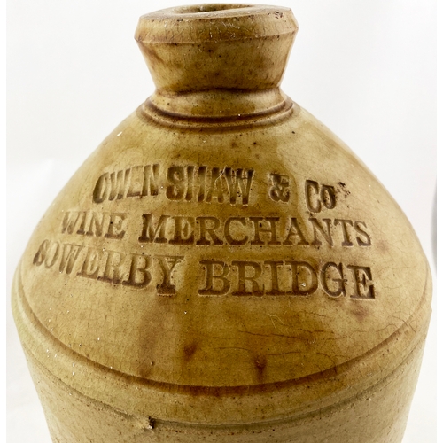 170 - SOWERBY BRIDGE HANDLED FLAGON. 12ins tall. Shoulder impressed OWEN SHAW & CO/ WINE MERCHANTS. Chippe... 