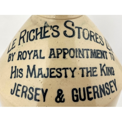 230 - JERSEY & GUERNSEY FLAGON. 11ins tall, all white, rear handle. LE RICHES STORES LTD.  An unusual flag... 