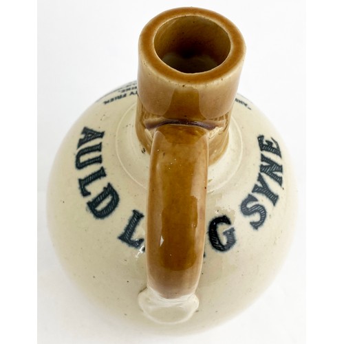 477 - AULD LANG SYNE WHISKY JUG. T.t., rear handle.Stunning highly detailed & crisply struck detailed pict... 