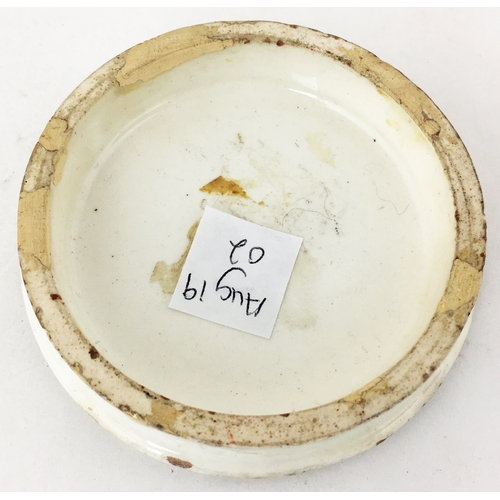 486 - CIRCASSIAN CREAM POT LID. 2.9ins diam. Very decorative outer border & varied lettering types. Some e... 