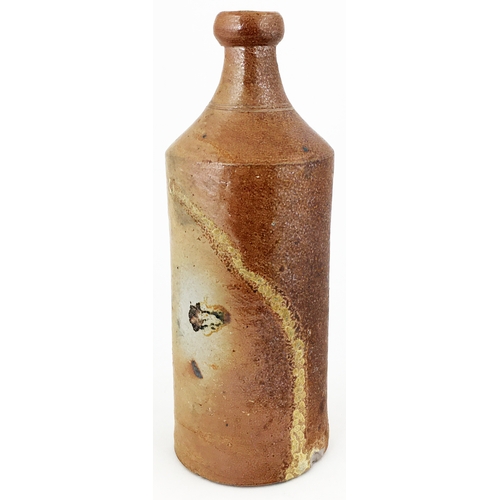 494 - EARLY EX MARK HAND THROWN BOTTLE. 9.5ins tall. Highly varied salt glaze finish, really crude, usual ... 