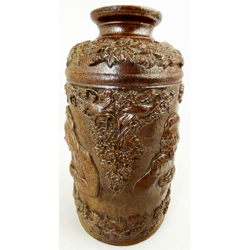 371 - SNUFF JAR. 7.8ins tall, dark brown salt glaze, wide mouth. Very heavily & elaborately embossed with ... 