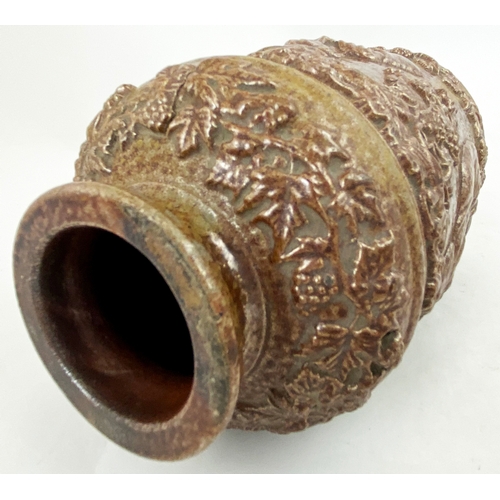 371 - SNUFF JAR. 7.8ins tall, dark brown salt glaze, wide mouth. Very heavily & elaborately embossed with ... 