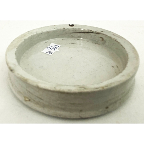 388 - ARECA NUT TOOTH PASTE POT LID. 2.7ins diam. Very strong black assymetric transfer with boats to cent... 