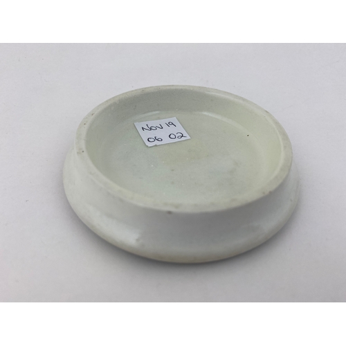 507 - SANOLINE TOOTH PASTE POT LID. 3.25ins diam. As previous but this with some transfer fading - an affo... 