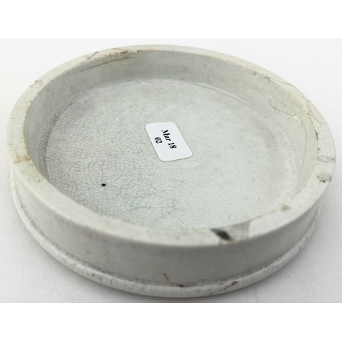 521 - HALIFAX FRENCH ALMOND CREAM POT LID. 3.6ins diam - quite large. Complex lay-out of letters & lines, ... 