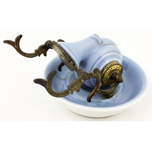 570 - CERAMIC SNAIL INKWELL. 4.2ins base diam. Light blue snail shaped well set on a similar coloured base... 