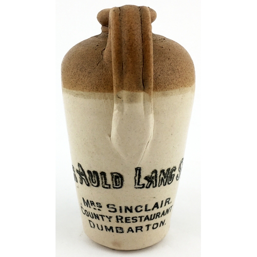 577 - DUMBARTON AULD LANG SYNE.  5ins tall, t.t., rea handle. Flat bodied pocket type jug depicting higlan... 