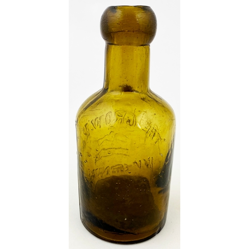 565 - INVERNESS SELTZER BOTTLE.  5.5ins tall, golden amber glass. Heavily embossed CROWN CO/ INVERNESS, cr... 