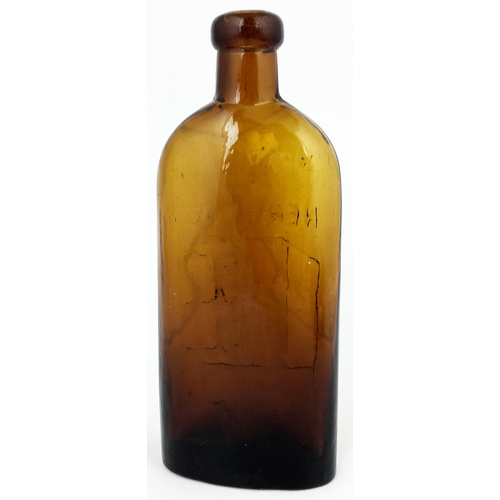 608 - WARNERS SAFE NERVINE BOTTLE. 7.8ins tall. Variating dark amber, sloping shoulders, long neck, blob l... 