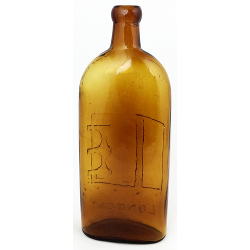 609 - WARNERS SAFE RHEUMATIC CURE BOTTLE. 9.6ins tall. Red/ amber, sloping shoulders, long neck, blob lip.... 