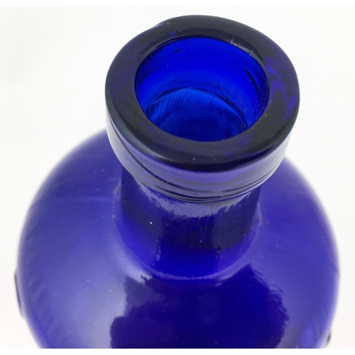 615 - TIPPERS POISON. (DP p41). 7.3ins tall. Cobalt blue tapering cylinder. Heavily embossed ‘POISON’ abov... 