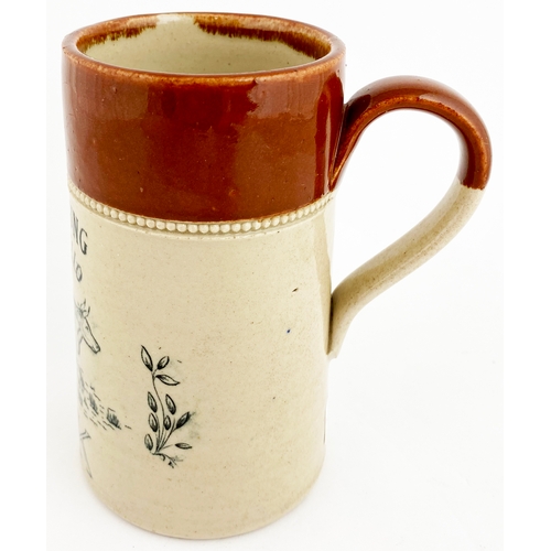 650 - STONEWARE MILK JUG. 5.75ins tall. Dark red-brown top, black transfer,. ‘Mrs Young/ Portobello’ above... 